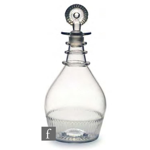 8190 - An early 19th Century Irish glass decanter, circa 1815, of Prussian form, with basal moulded flutes ... 