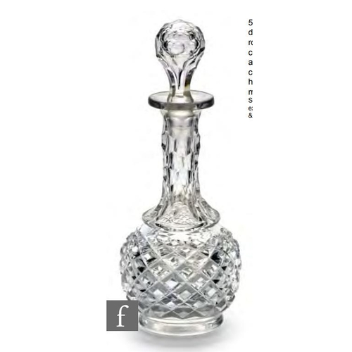 8252 - A late 19th Century miniature decanter of globe and shaft form set on an applied rounded disc foot, ... 