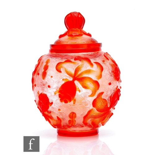 742 - An early 20th Century Peking Glass cameo jar and cover, the footed ovoid jar rising to a domed cover... 