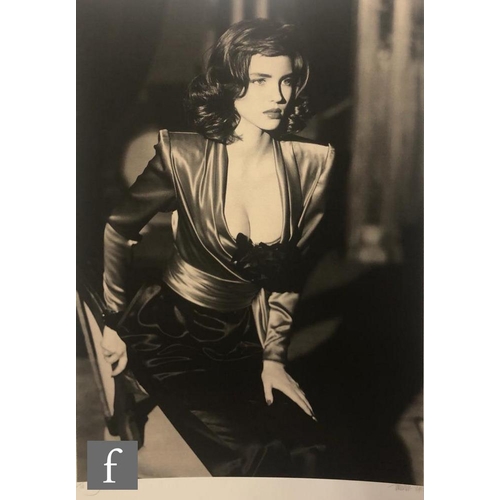 1151 - Terence Donovan FRPS (1936-1996) - Fashion model wearing satin, monochrome photolithograph, signed i... 