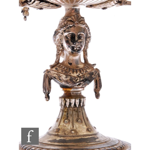 264 - A 19th Century silver plated comport, marble circular base below a column modelled as the head and s... 