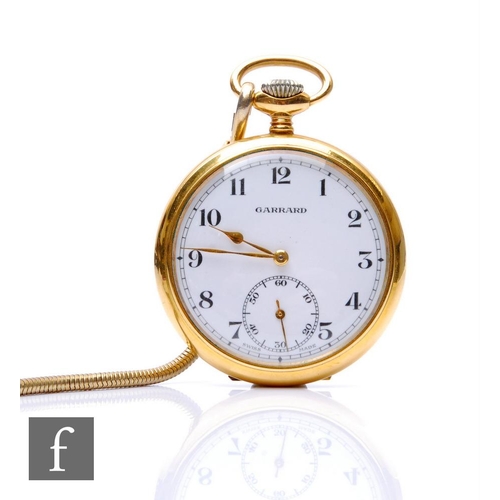 312 - A gold plated crown wind Garrard pocket watch with Arabic numerals to a white enamelled dial engrave... 