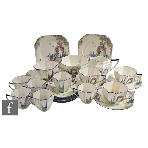 511 - A 1920s Shelley Queen Anne shape part teaset decorated in the Archway of Roses pattern comprising mi... 