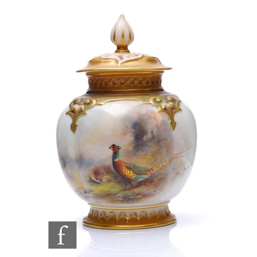 514 - A Royal Worcester small pomander and cover, shape H278, the footed fluted ovoid body with relief han... 