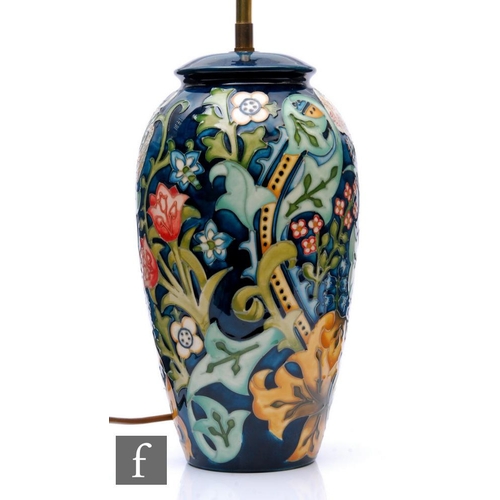 524 - A large Moorcroft Pottery table lamp, shape 393 decorated in the Golden Lily pattern, designed by Sa... 