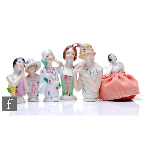 536 - A collection of Art Deco porcelain half dolls, all of varying designs similarly decorated and picked... 