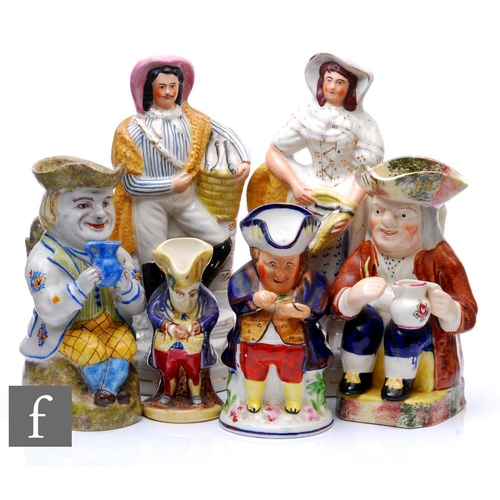 543 - A collection of Staffordshire flatbacks and toby jugs, to include a French tin glazed faience exampl... 