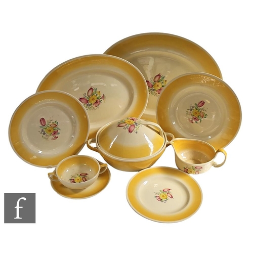 547 - A Susie Cooper part dinner service, to include two meat plates, six side plates, six dinner plates, ... 