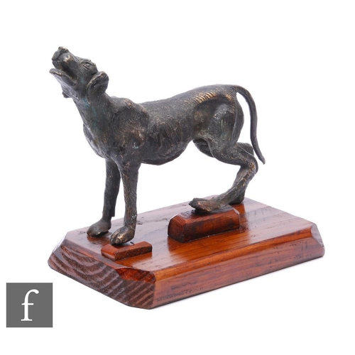 350 - A late 20th Century cast bronze figure by after Pierre Jules Mene, of a howling hunting dog, on wood... 