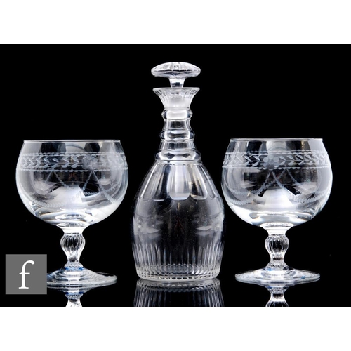 893 - A Georgian clear crystal decanter, of ovoid form with facet cut collar and three neck rings, the bod... 