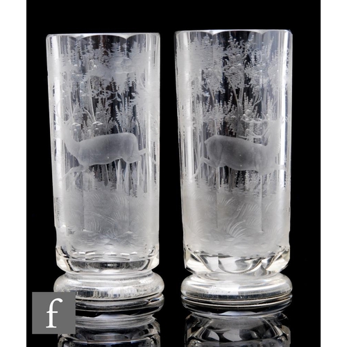 899 - A pair of 19th Century Bohemian, possibly Moser, clear crystal tumblers, of cylinder form with facet... 