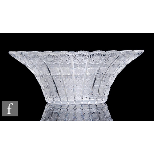 927 - A 20th Century American clear crystal cut bowl, of oval section, the body finely cut with bands of s... 