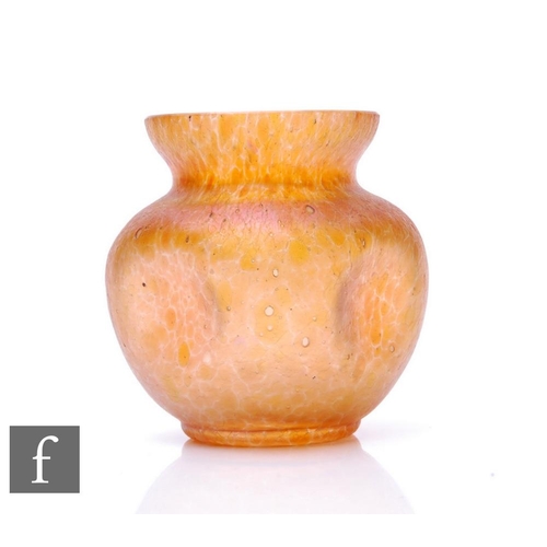 928 - A small early 20th Century Loetz glass vase of shouldered ovoid form with dimple sides and everted r... 