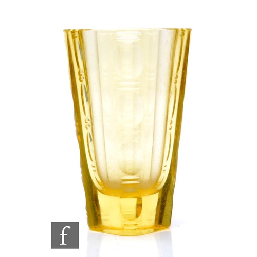 941 - A 1930s Czech Art Deco glass vase, possibly Moser, the tapered facet sleeve form body cut on the sho... 