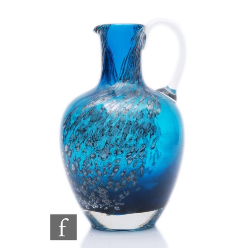 948 - A large Schott Zwiesel Florida glass jug designed by Heinrich Loffelhardt, the tapered shouldered ov... 