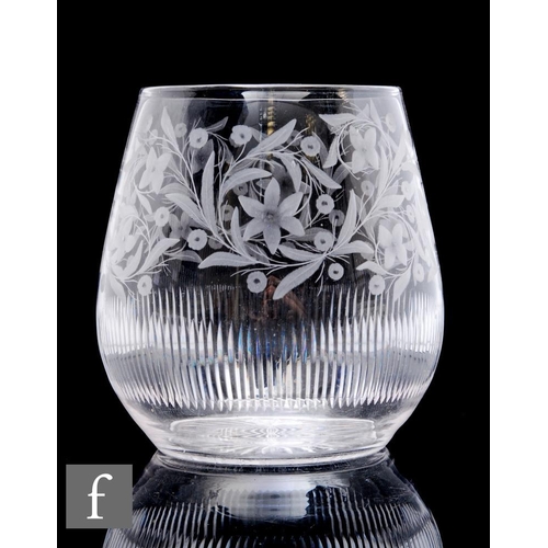 919 - A 20th Century clear crystal glass vase of tapered ovoid form, engraved with a repeat foliate scroll... 