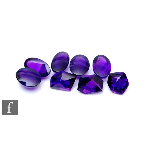 104 - A cut and polished faceted irregular cut amethyst stone 17.5mm x 15mm x 11mm, with five oval cabacho... 