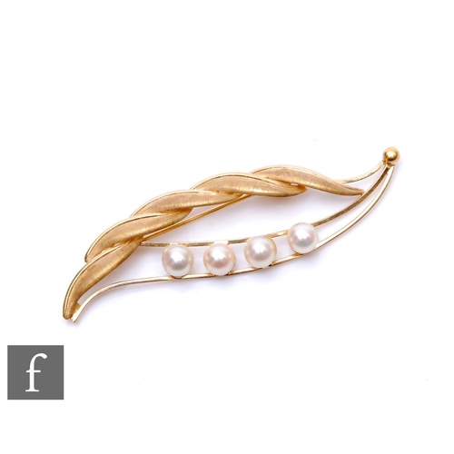 108 - A 14k brooch modelled as a leaf and detailed with four cultured pearls, weight 4g, length 6cm, stamp... 