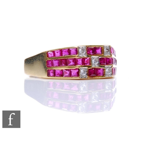 155 - A 14ct ruby and diamond ring comprising three horizontal rows of channel set square cut rubies detai... 