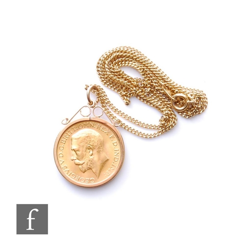 83 - A George V full sovereign dated 1927, loose to a 9ct pendant mount and suspended from a 9ct fine cur... 