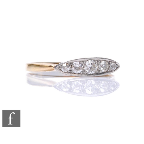 84 - An early 20th Century 18ct diamond five stone boat shaped ring, old cut stones to an elliptical shap... 