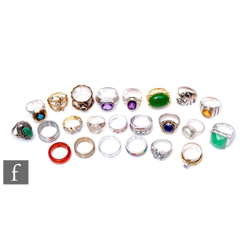 89 - Twenty four assorted silver, white metal and other rings to include stone set and other examples. (2... 