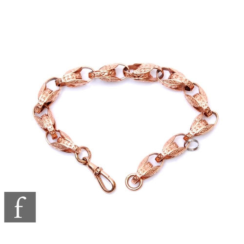 95 - A 9ct rose gold pierced fancy link bracelet with chased decoration, weight 23.5g, length 21cm, termi... 