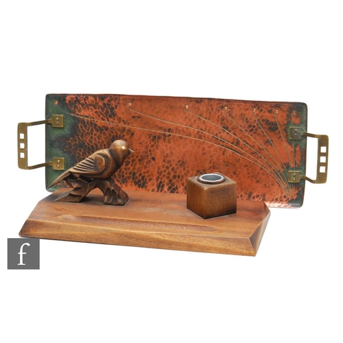 9069 - A small Secessionist brass and copper two handled serving tray, width 43cm, and an Art Deco wooden i... 