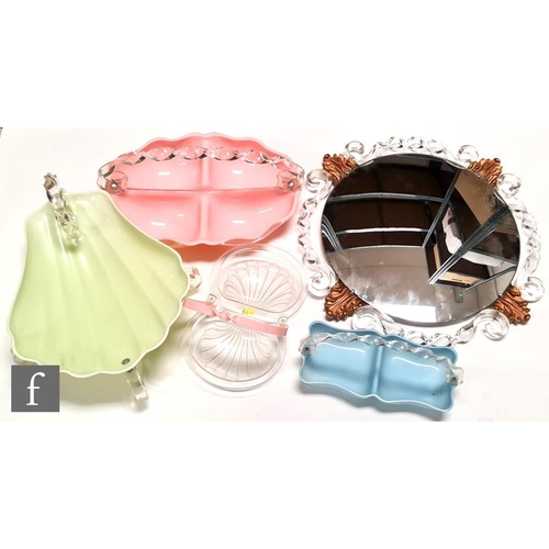 9070 - A small collection of assorted early to mid 20th Century plastic items, to include a Atsonea mirror ... 