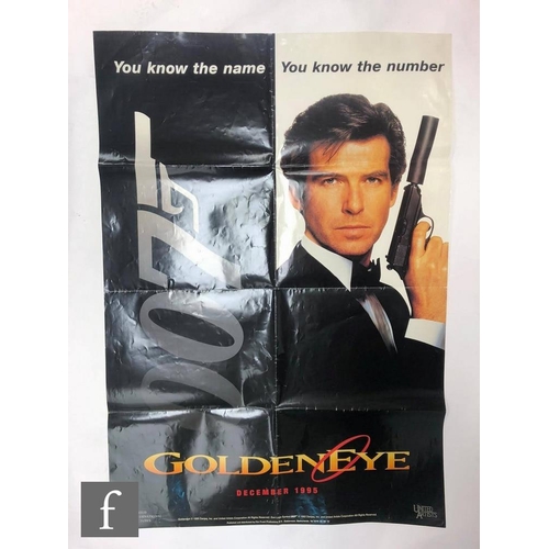 9074 - Two James Bond related posters comprising a Goldeneye teaser one sheet poster and a James Bond Golde... 