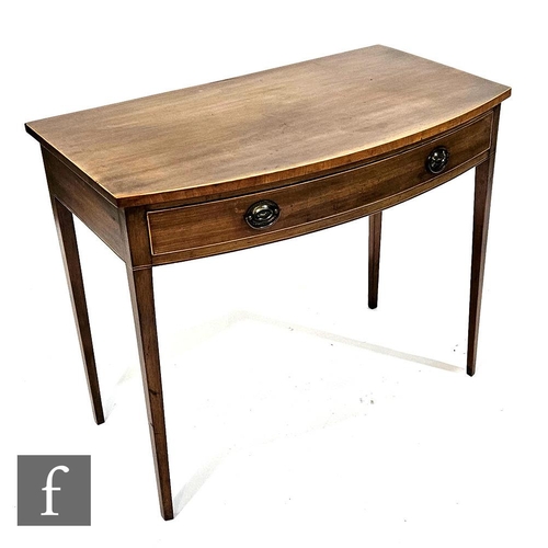 1001 - A 19th Century mahogany bow fronted side table, fitted with a single frieze drawer over square taper... 