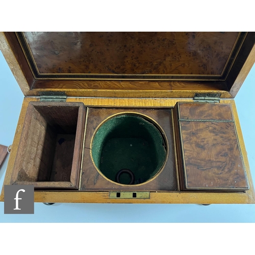 415 - A 19th Century crossbanded birds eye maple tea caddy of sarcophagus form, fitted with two canisters ... 