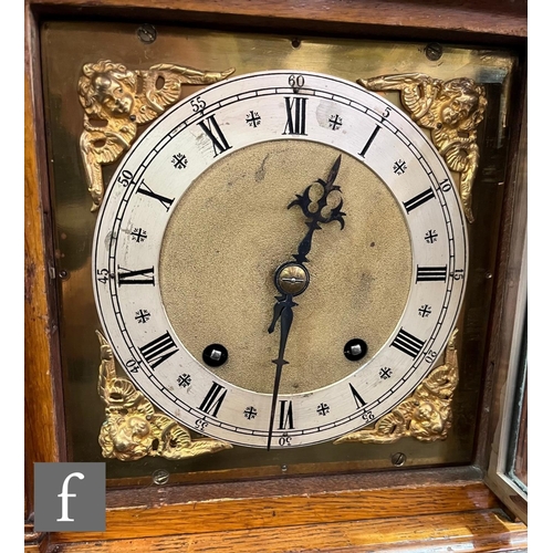 400 - A late 19th Century bracket clock with architectural style oak case, the brass dial with silvered ch... 