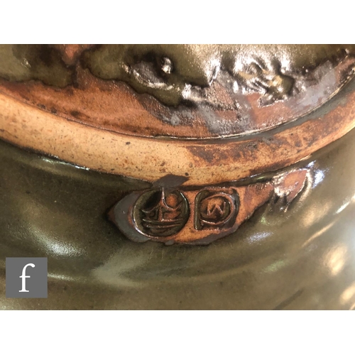 472 - Amended Description - A large Michael Cardew for Wenford Bridge Pottery shallow bowl glazed in a cel... 