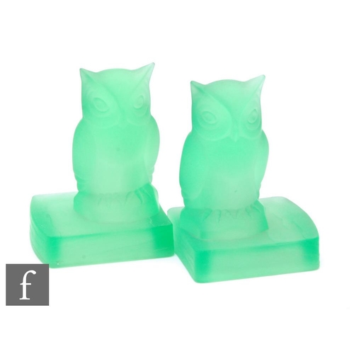 807 - A pair of 1930s Bagley frosted uranium green glass bookends, each in the form of an owl on a square ... 