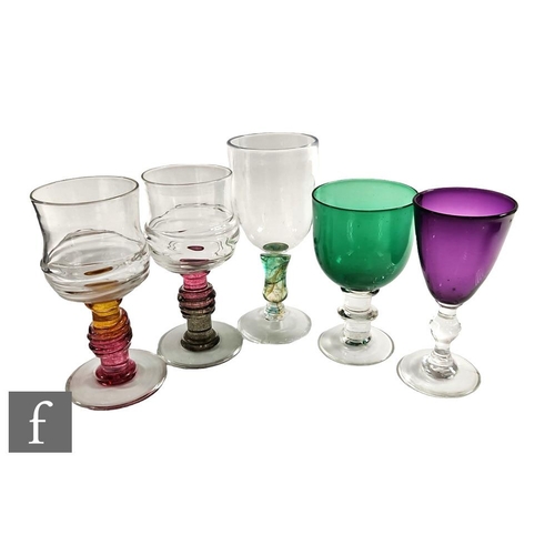 841 - A collection of contemporary studio glass goblets with various bowls and decorative stems to include... 