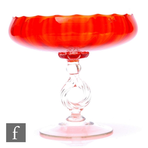 844 - A 20th Century continental glass tazza, the squat ovoid bowl with ribbed decoration all in an orange... 