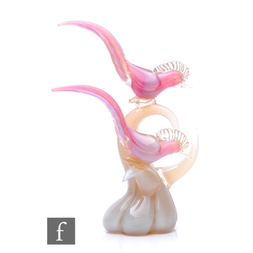 846 - A 20th Century Murano glass figure, modelled with a pair of birds decorated internally in pink and c... 