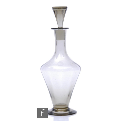 863 - A 20th Century glass decanter, of high shouldered footed conical form with collar neck, complete wit... 