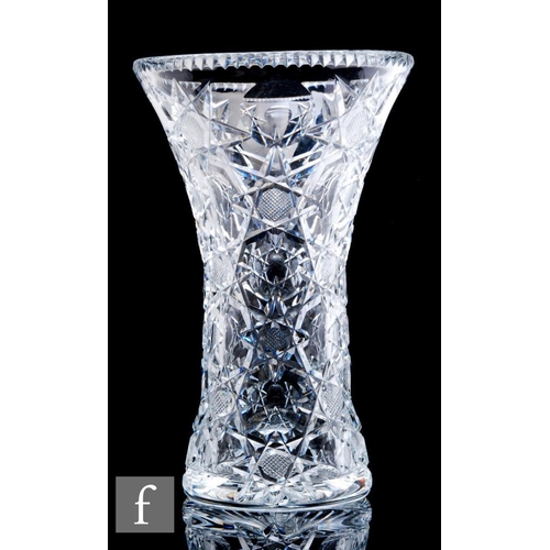 865 - A large 20th Century Royal Brierley clear crystal glass vase, of waisted form decorated in the Const... 