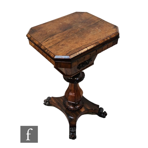 1017 - A 19th century rosewood work table, the crossbanded octagonal top fitted with a compartmentalised in... 