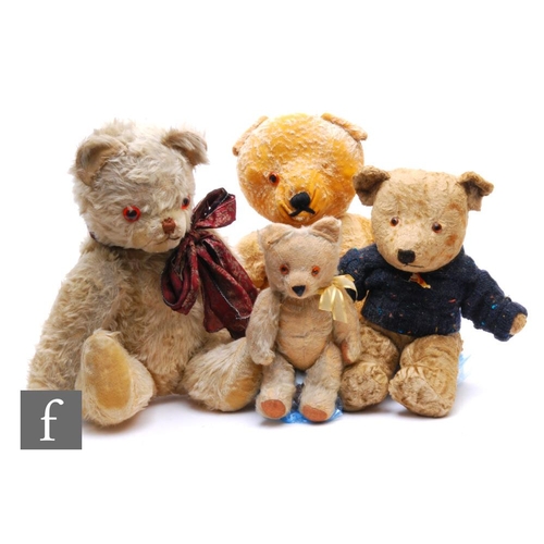 9083 - A group of four English mid Century and later teddy bears, height of tallest 58cm, all well loved. (... 