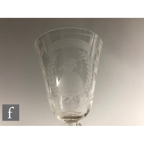 911 - A 20th Century copy of a clear crystal Jacobite goblet, the round funnel bowl engraved with Jacobite... 