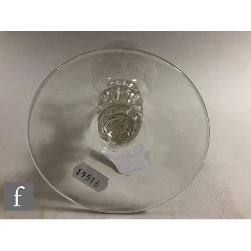 911 - A 20th Century copy of a clear crystal Jacobite goblet, the round funnel bowl engraved with Jacobite... 