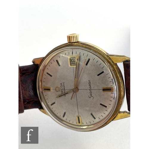 298 - A mid 20th Century gold plated Omega Seamaster automatic wrist watch, batons and date facility to a ... 