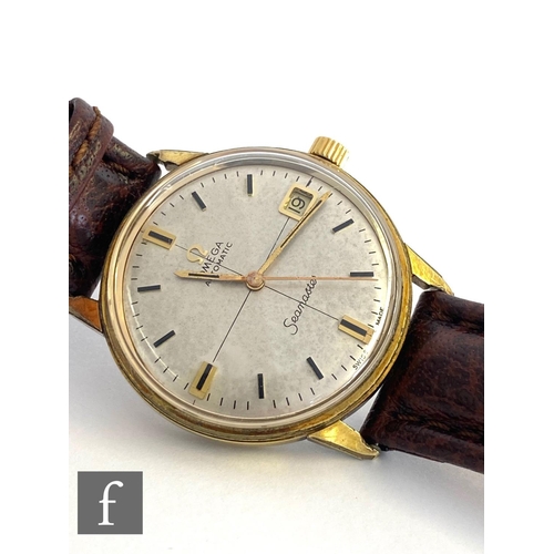 298 - A mid 20th Century gold plated Omega Seamaster automatic wrist watch, batons and date facility to a ... 