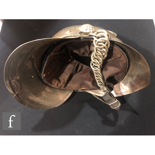 327 - An early 20th Century plated Fire Officer's helmet, Merry Weather pattern for the Gloucester Fire Br... 