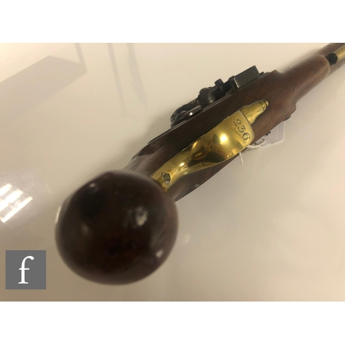 434 - An 18th Century flintlock pistol by H.Nock London, proof marked, 22cm barrel, the brass trigger guar... 