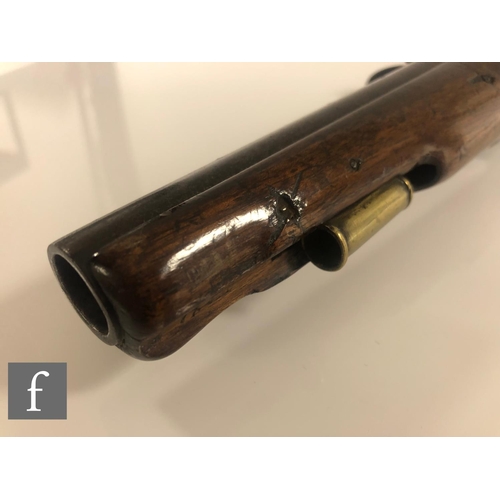 434 - An 18th Century flintlock pistol by H.Nock London, proof marked, 22cm barrel, the brass trigger guar... 