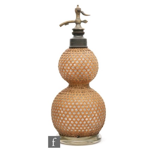 9094 - An early 20th Century French soda siphon of double gourd form with wicker work cover, inscribed Veri... 